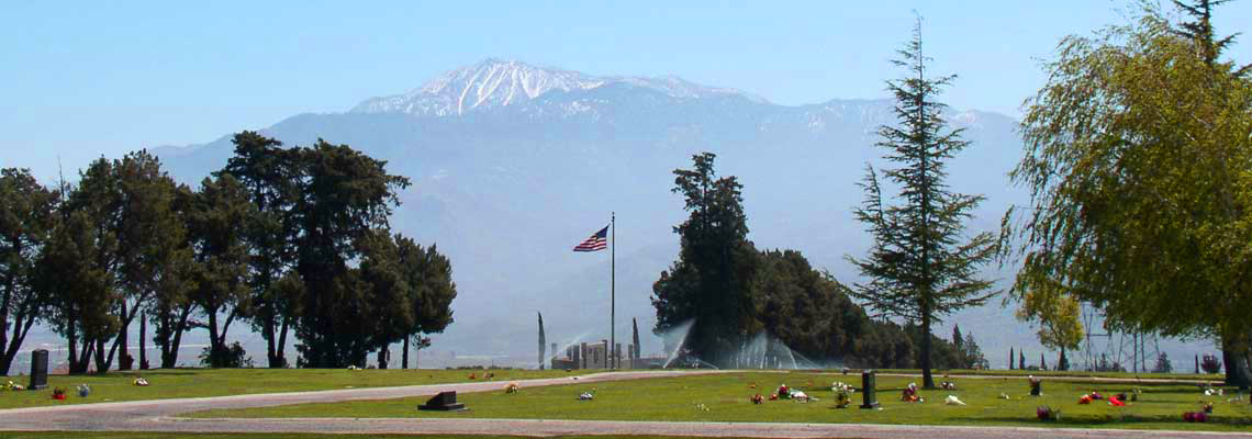 Picture of Flag Pole with Mountains in Background at San Gorgonio Cemetery.