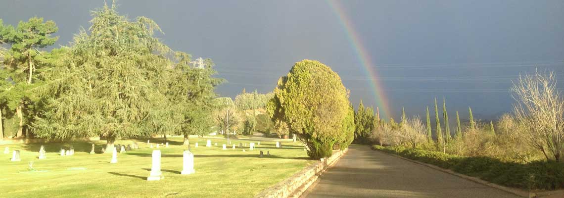 Picture of Grave Markers and Rainbow at Summit Cemetery District.